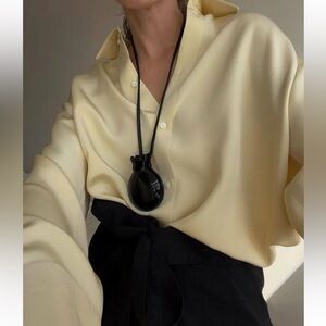 CASTANET MIROR ACRYLIC Necklace In Black